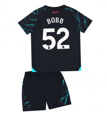 Manchester City Oscar Bobb #52 Tercera Equipación Niños 2023-24 Manga Corta (+ Pantalones cortos)